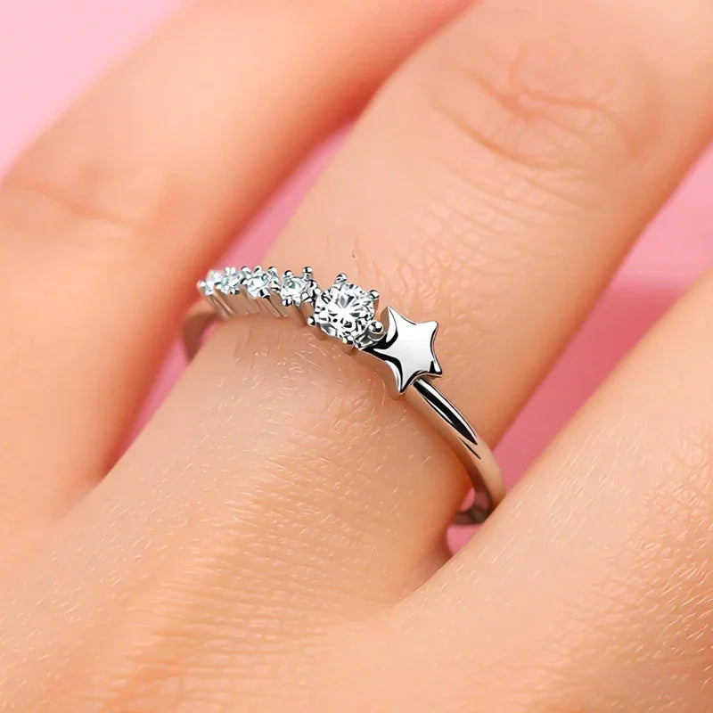 CZ ring with star detail and pavé stones