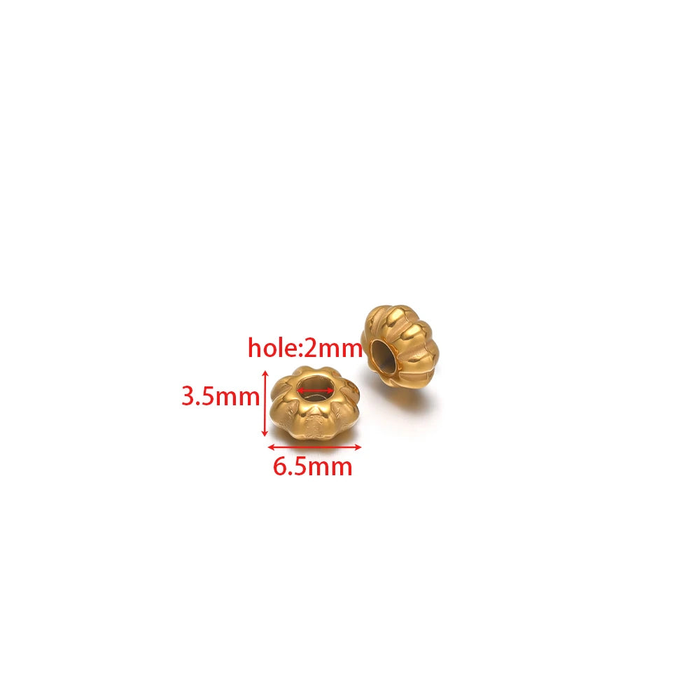 Gold striped pumpkin spacer beads with small 2mm hole, rounded ribbed charm
