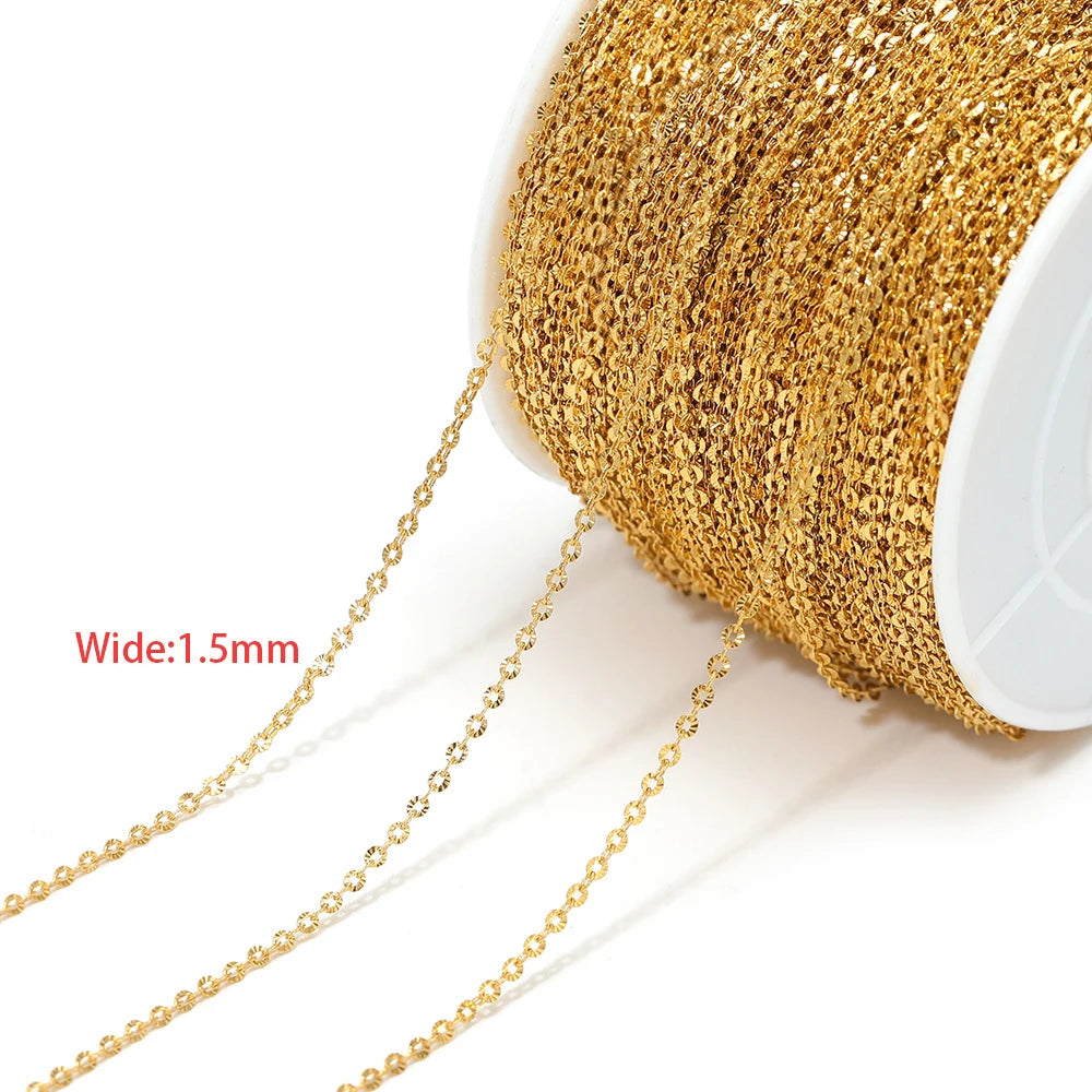 Fine gold textured chain mesh on a spool with hanging links