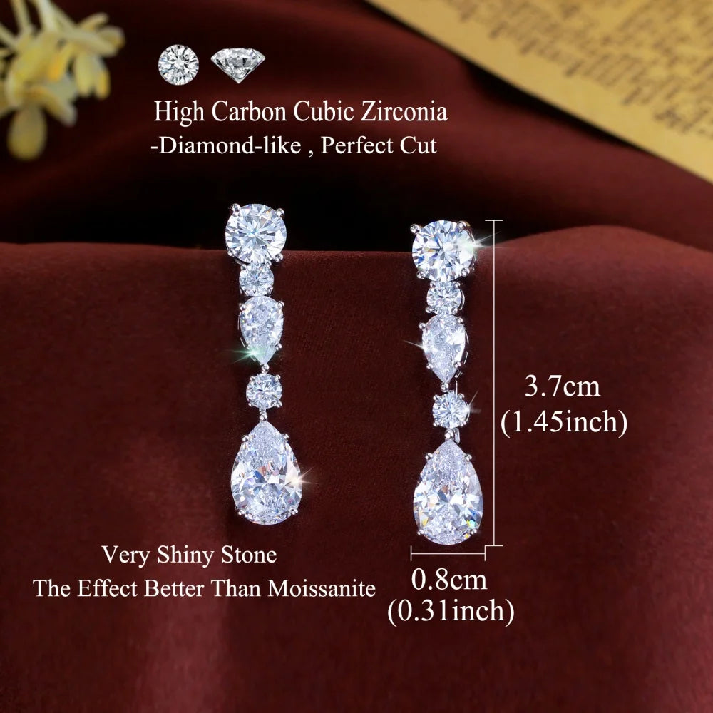 Long cubic zirconia drop earrings, shown with measurements of 3.7 by 0.8 cm.