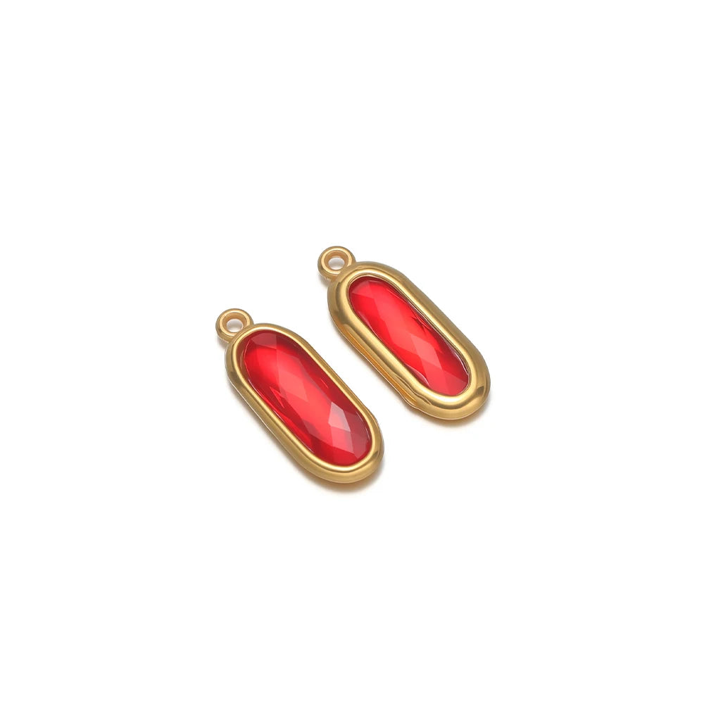 Oval glass charm connectors, red glass in gold bezels, with hanging loops
