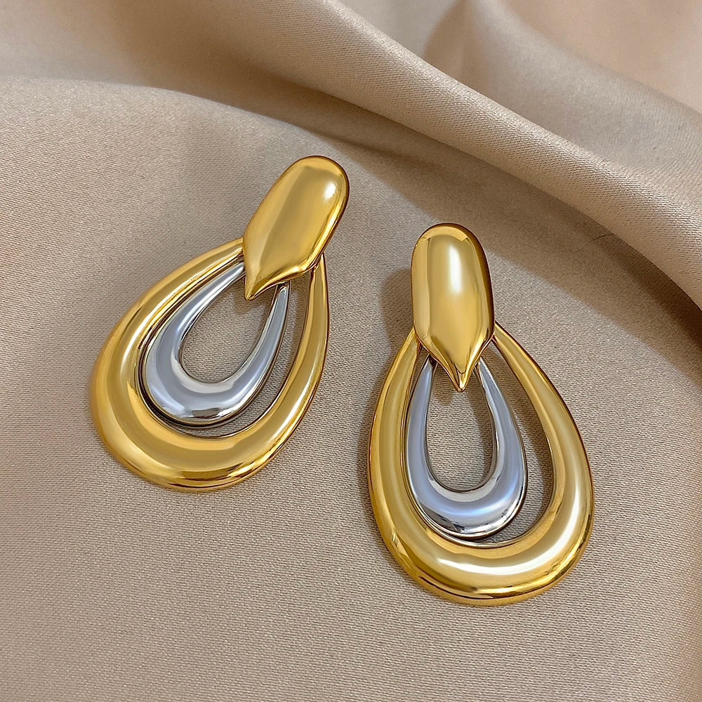 Large two-tone gold and silver teardrop hoop earrings