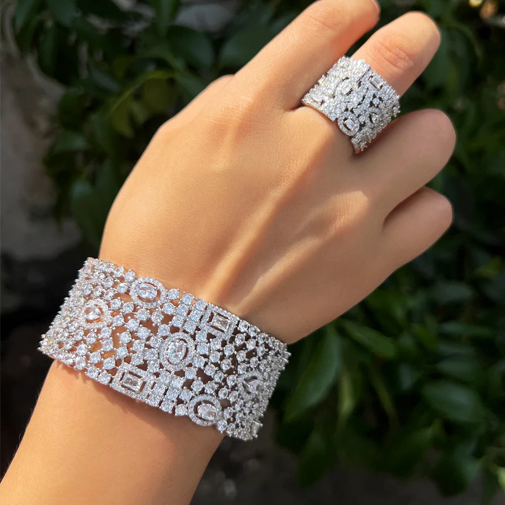Wide silver-tone cubic zirconia cuff and matching ring with geometric stone settings