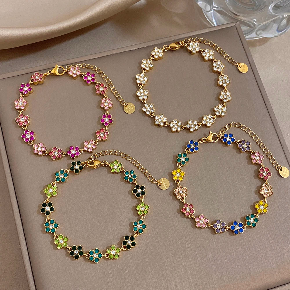 Gold-tone chain bracelet with colorful flower zircon beads and round links, adjustable clasp
