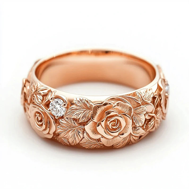 Rose gold floral CZ ring with engraved roses and leaves, rounded center stone
