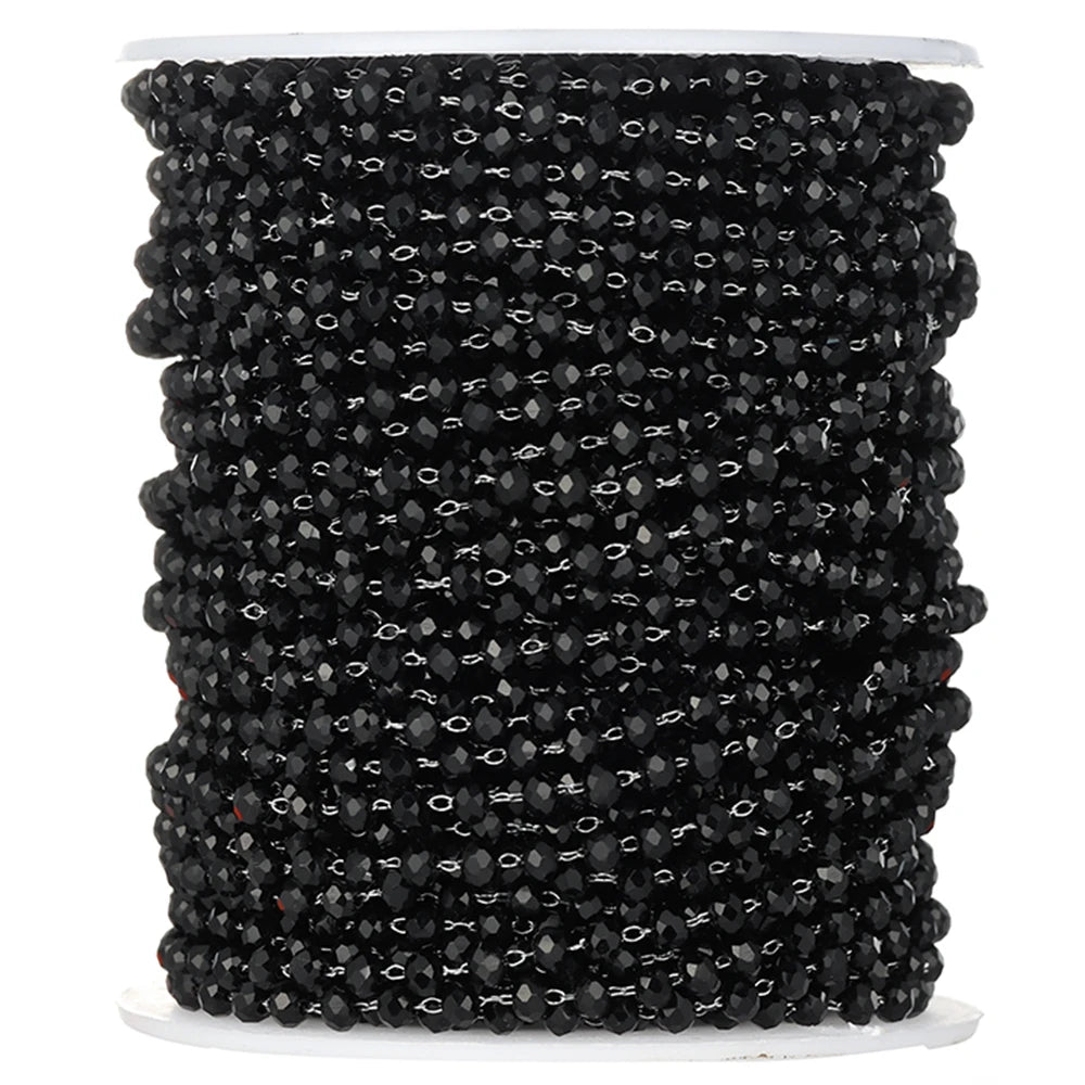 Black beaded necklace chain spool with faceted bead links