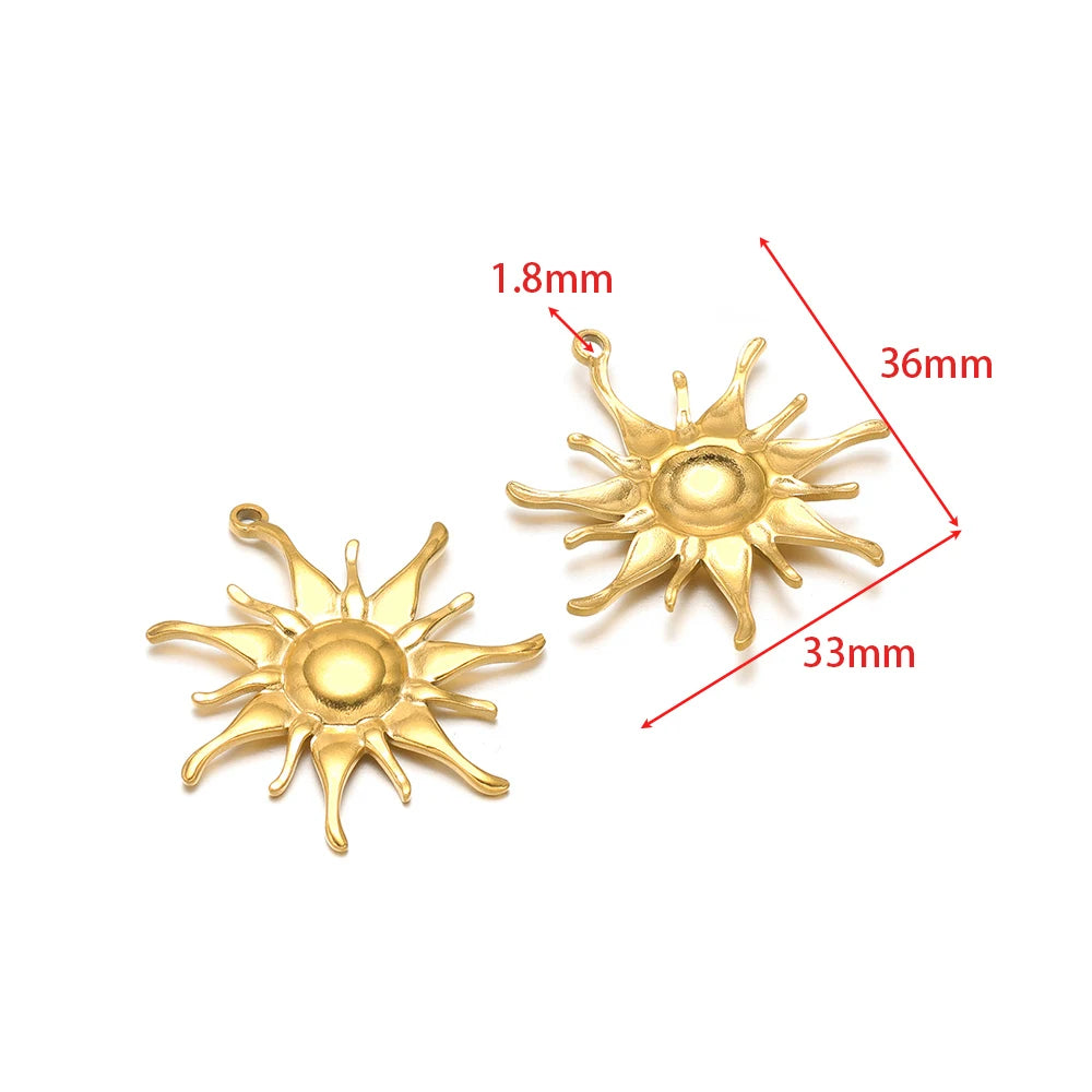 Gold-tone smiling sun charms with hanging loops, with size measurements