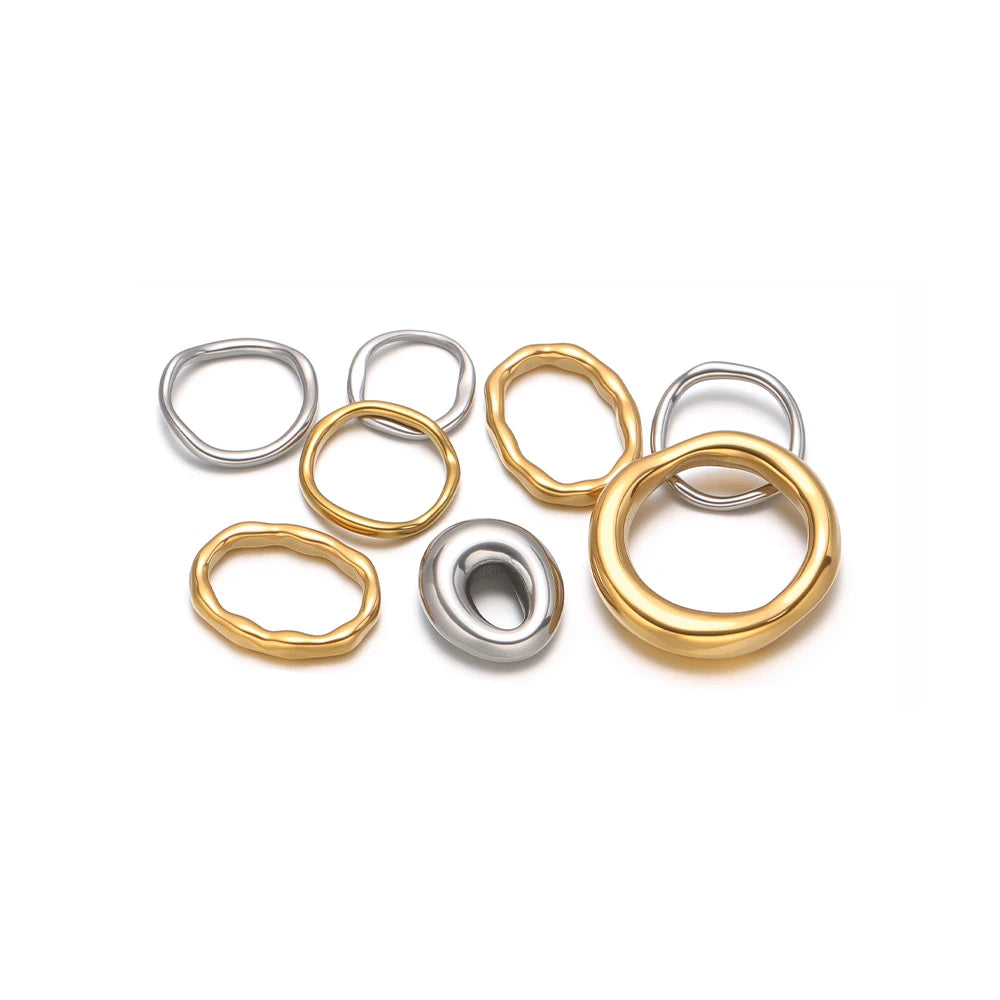 Set of five mixed metal open ring charms, large round loops and small oval rings