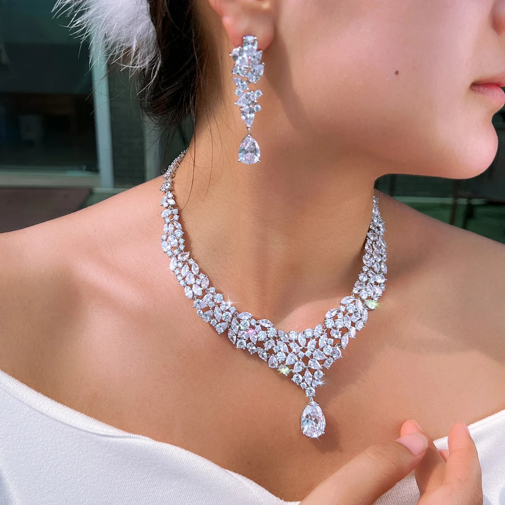 CZ bridal jewelry set worn, with a V-shaped necklace and matching drop earring