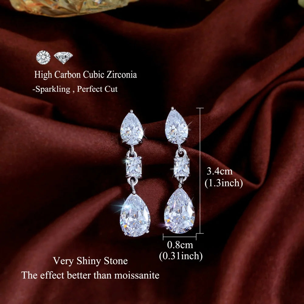 Crystal teardrop dangle earrings, 3.4 cm long and 0.8 cm wide.