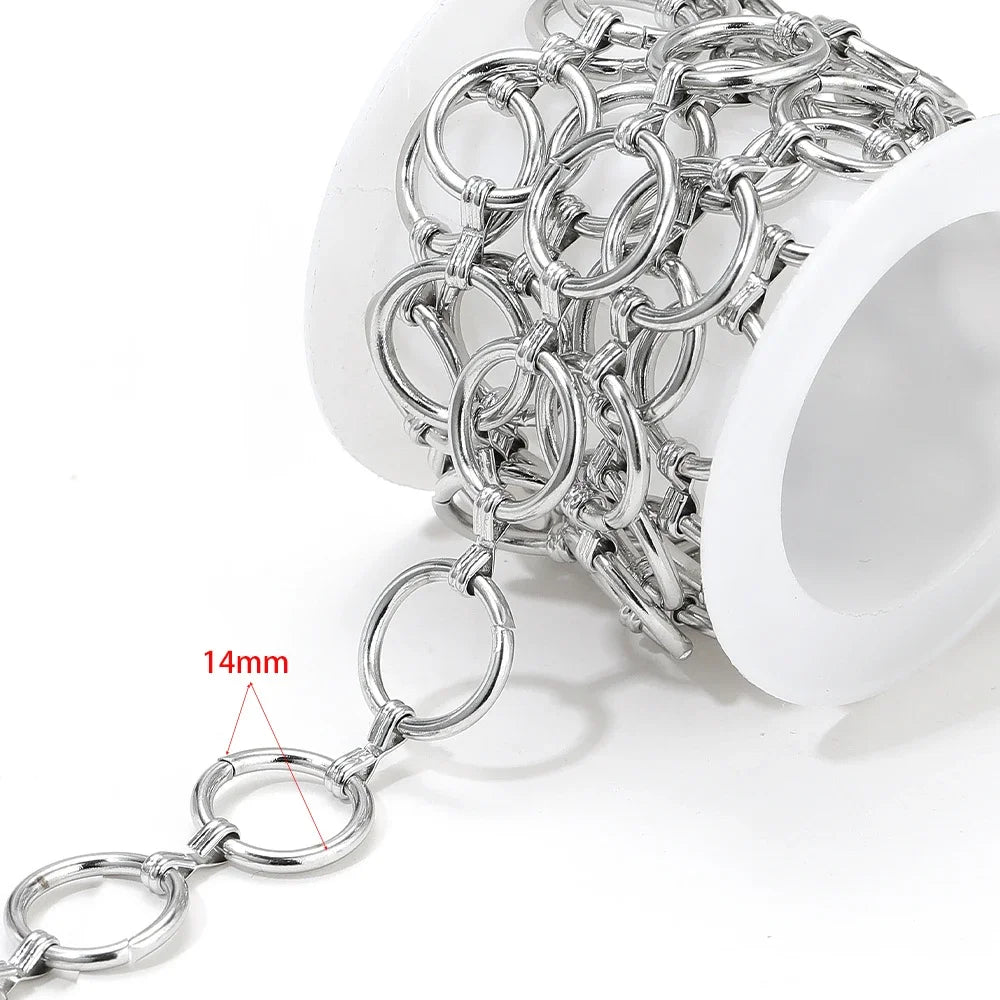 Stainless steel chain necklace with oval link connectors, labeled 14mm on holder