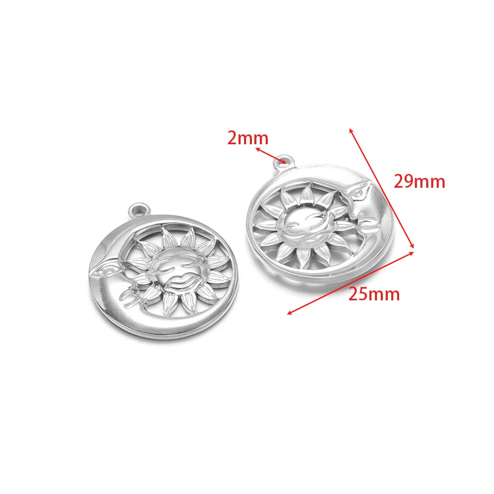 Silver circular sun-motif charm pendant with embossed face and bail loop