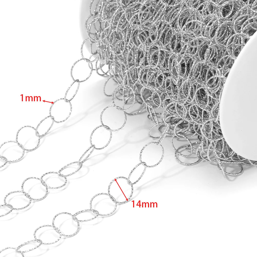 Close-up of silver hollow oval chain links with ring texture for jewelry making