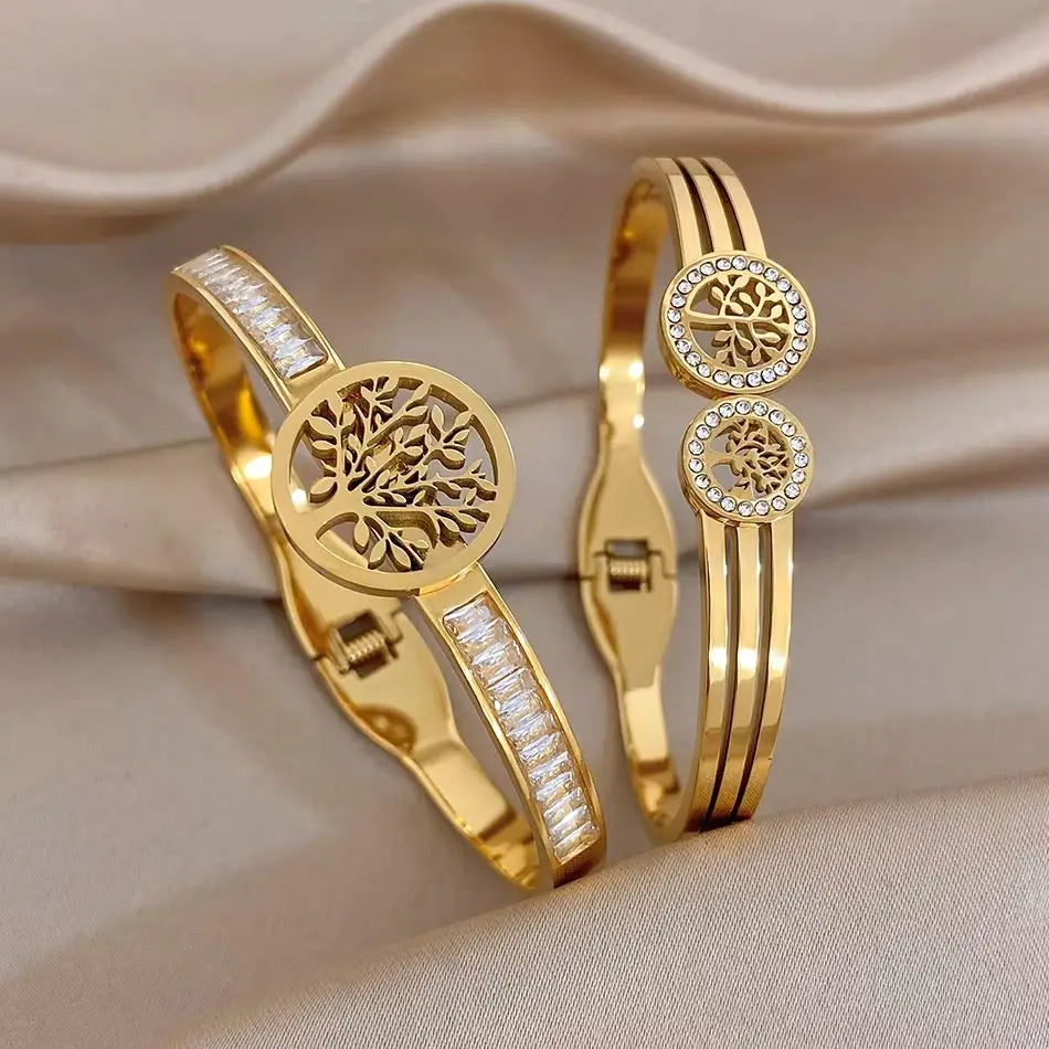 Gold-tone stackable bracelet set with tree-of-life charm and clear stone accents
