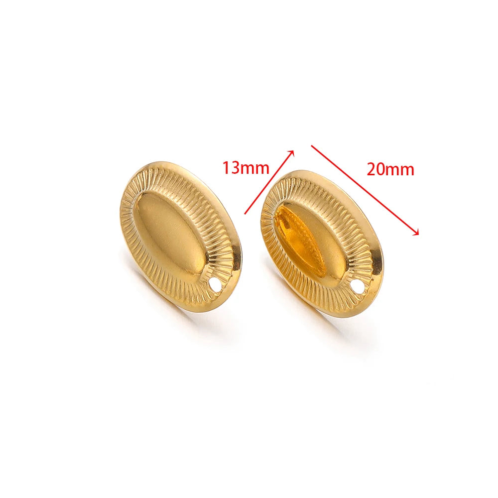 Gold oval earring connector backs with ridged rim and domed center