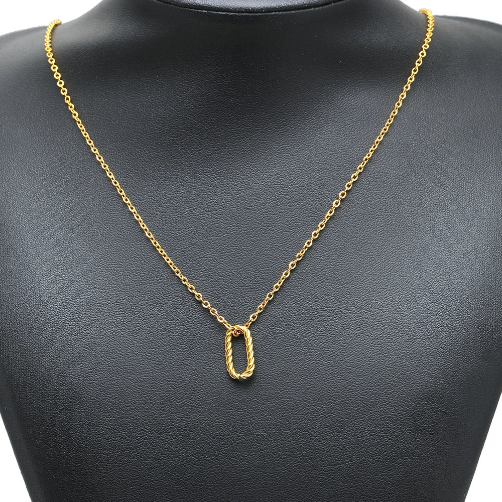 Gold oval twist-open pendant connector charm on a necklace chain