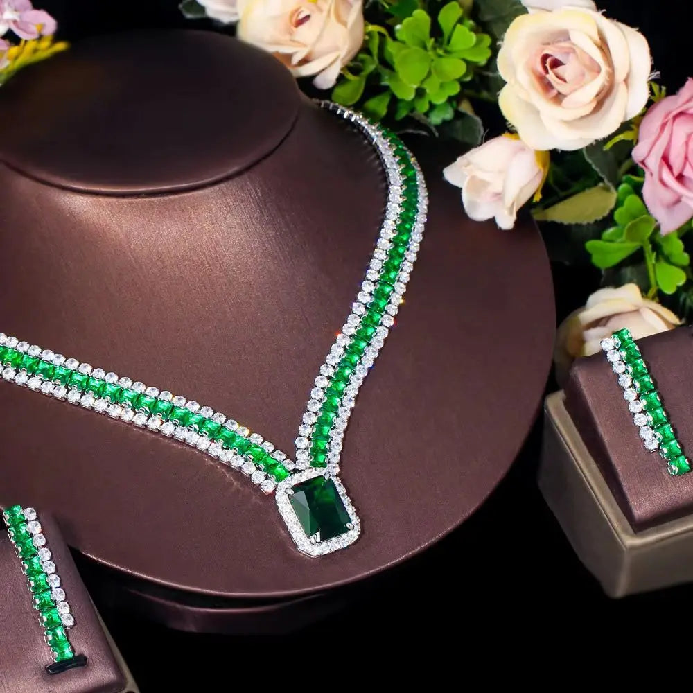 Green cubic zirconia rectangle pendant necklace with matching drop earrings, angled view