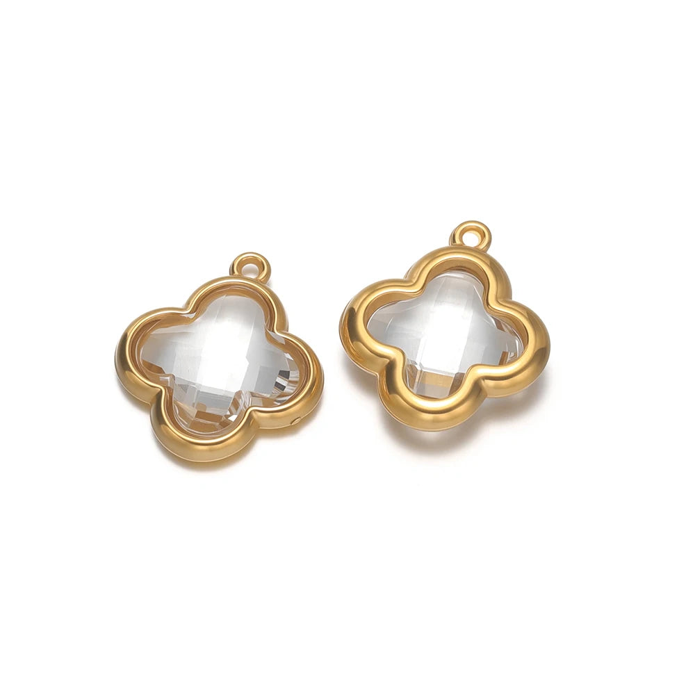 Four-leaf clover glass charm pendant with clear gem and gold-tone loop