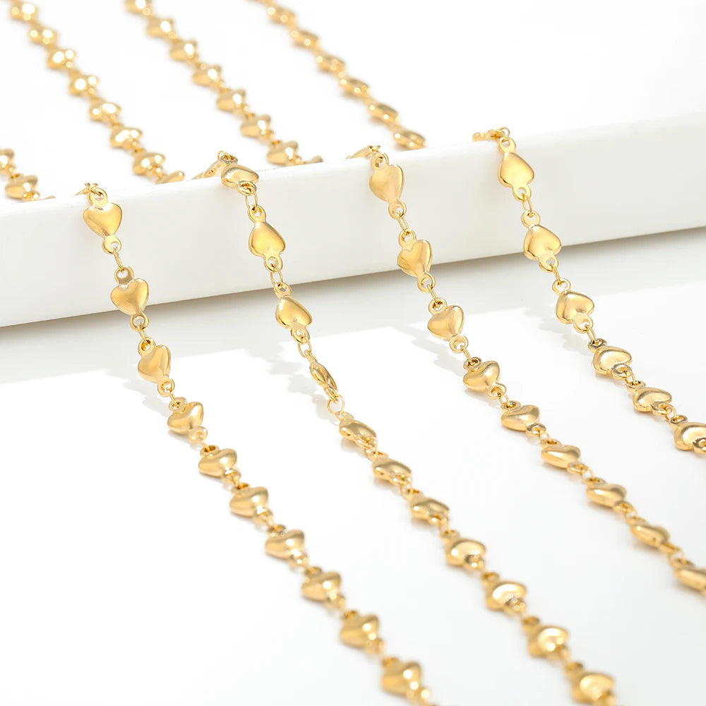 Gold heart chain with repeating small heart-shaped links on a continuous strand