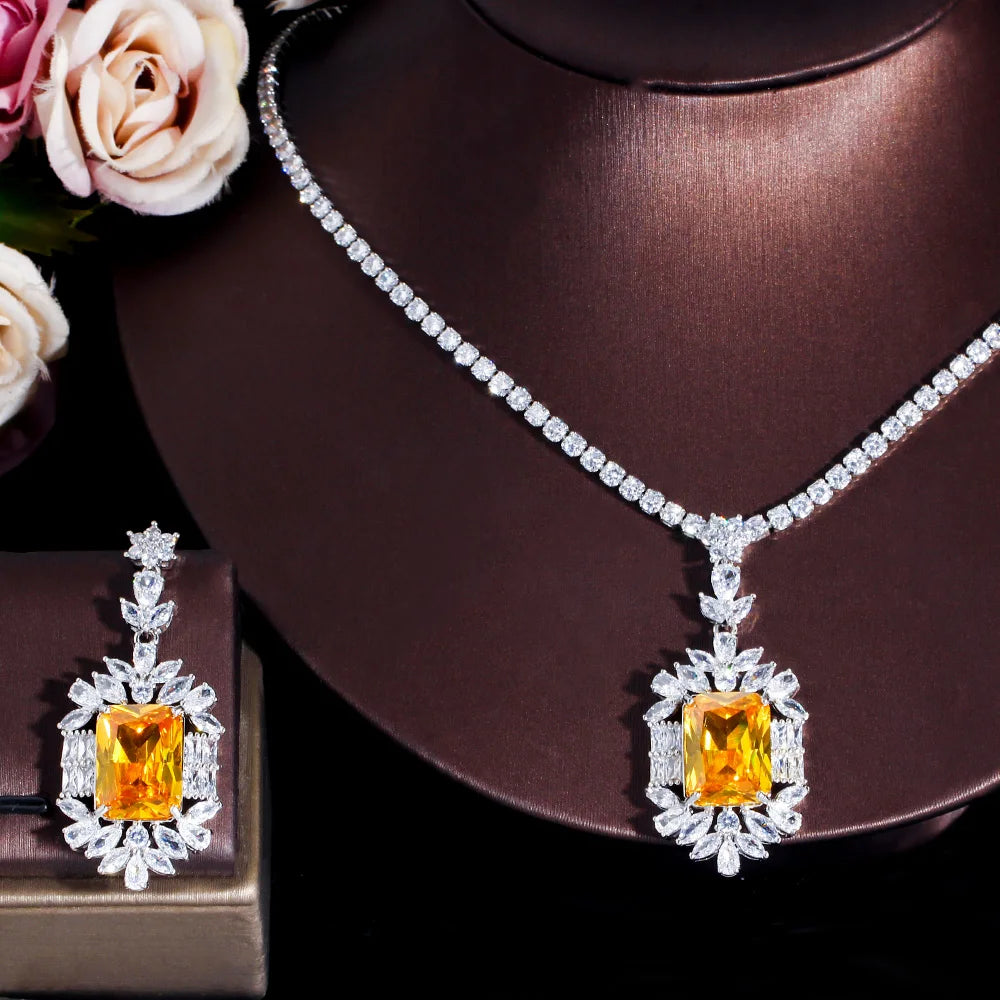 Cubic zirconia necklace and earring set with yellow square centerpiece stones, silver-tone