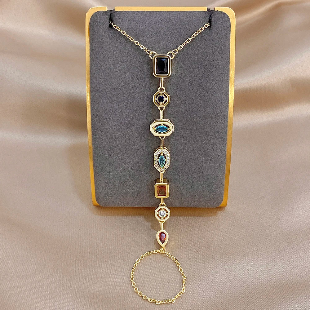 Gold-tone geometric zircon bracelet with multicolor drop charms and round chain link
