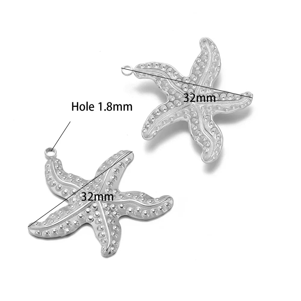 Silver starfish pendant charms with top loop; two rhinestone-studded starfish