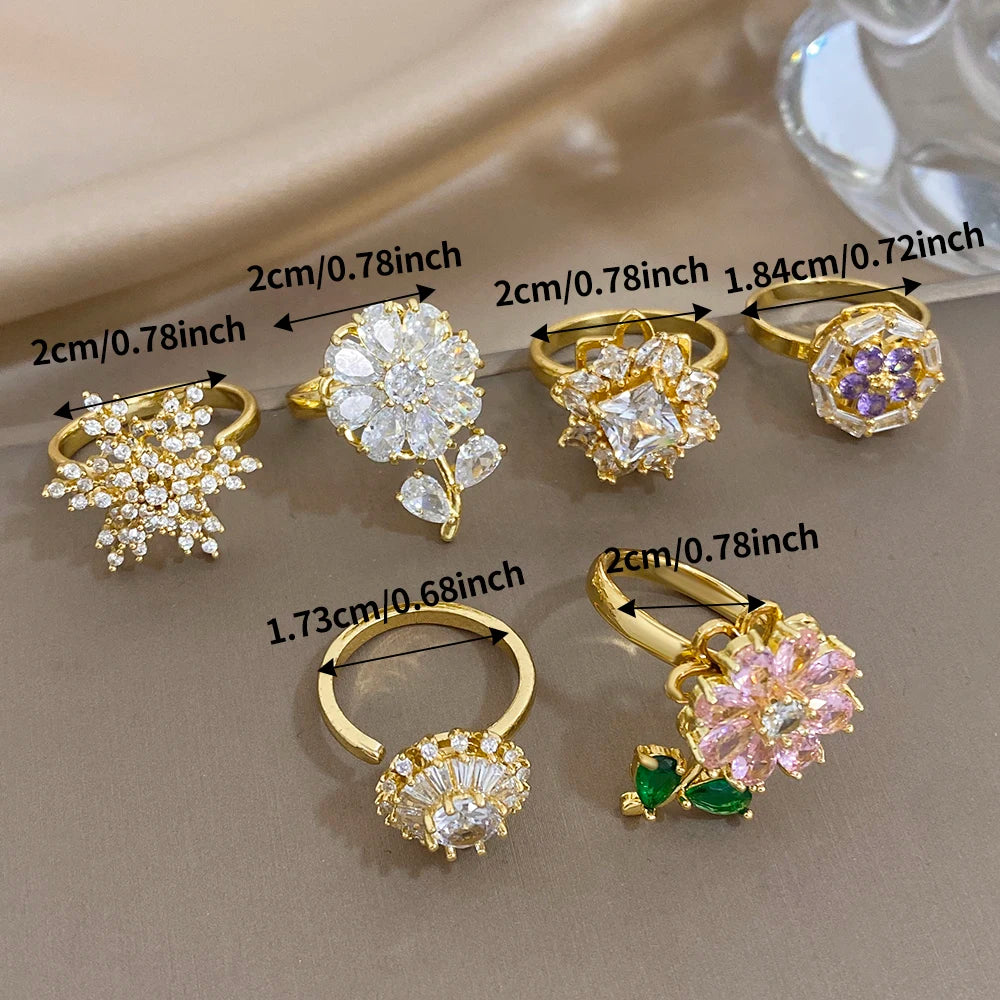 Gold-plated copper flower zirconia ring assortment with clear and purple stones