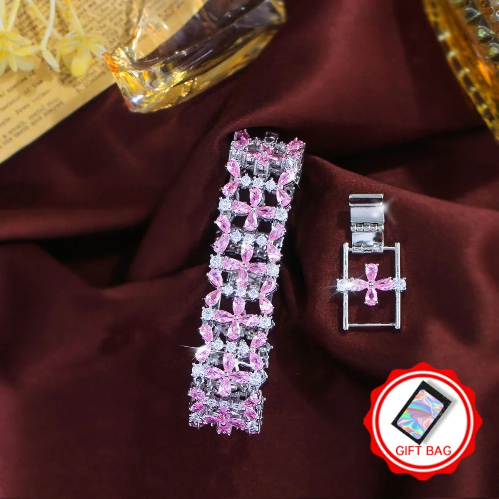 Pink and clear floral crystal tennis bracelet with a matching extension clasp