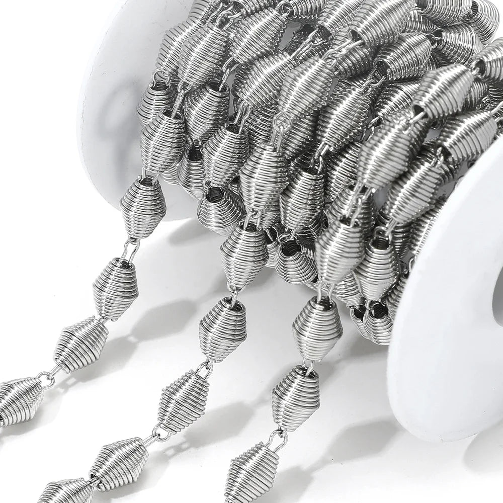 Silver-tone spiral chain with tightly coiled flower swirl link beads