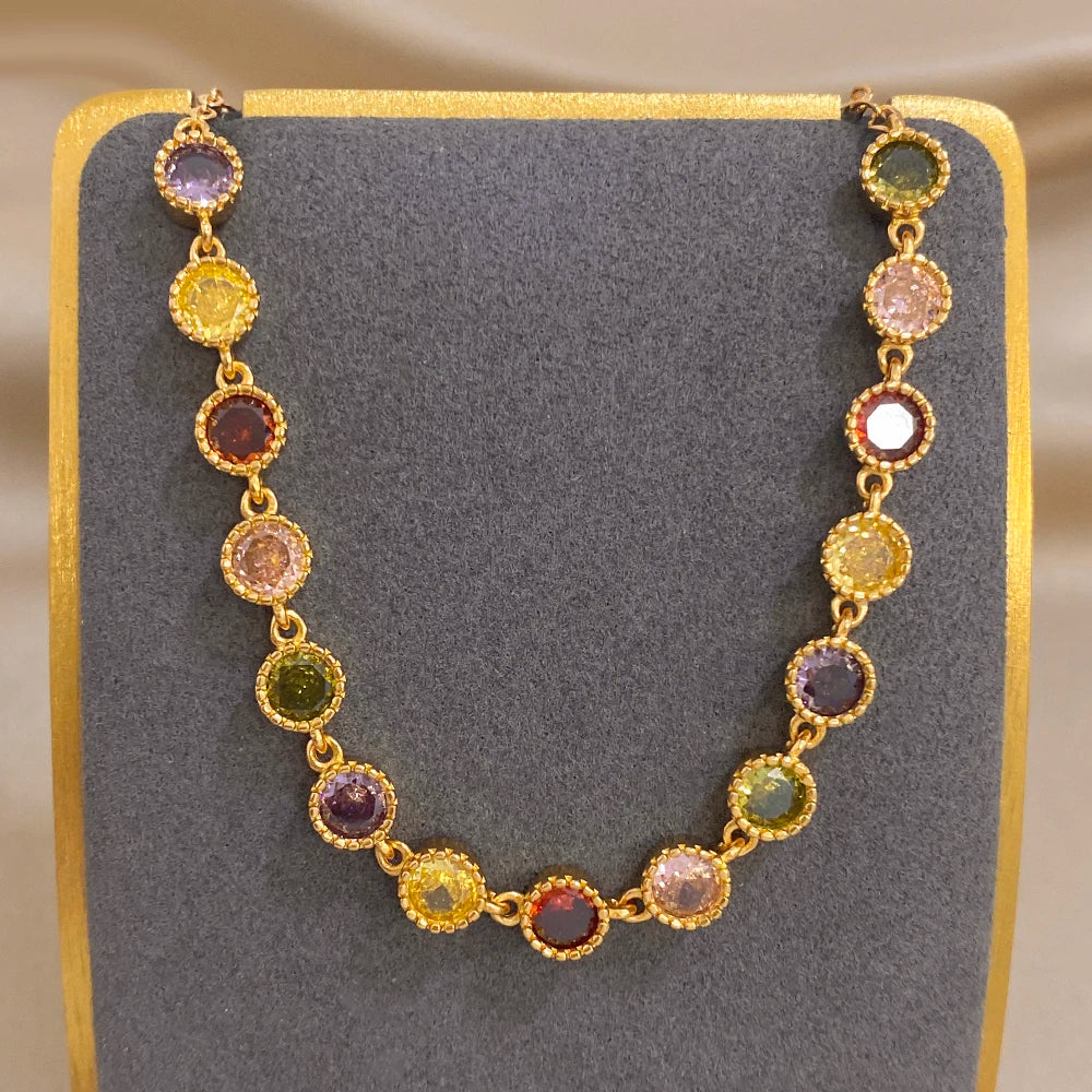 Multicolor zirconia bead tennis bracelet in gold tone with round gemstone links