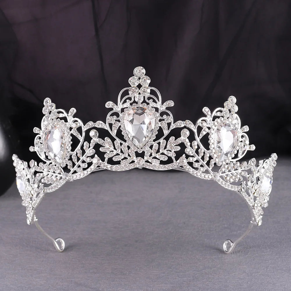 Silver bridal tiara with sparkling rhinestone crown and large oval side stones