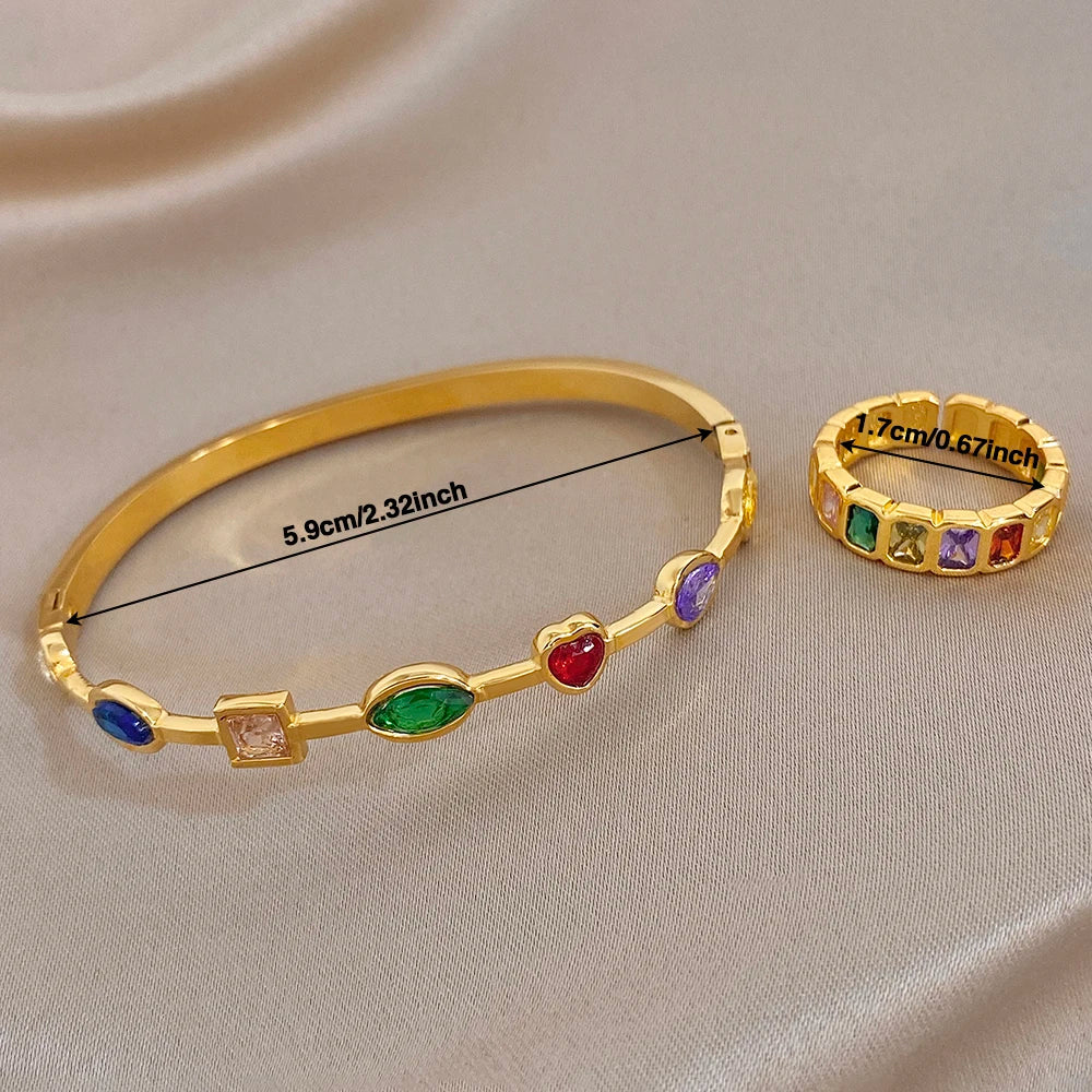Gold-tone bangle bracelet and band ring set with oval, square, and heart-like gems