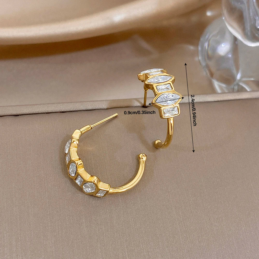 Gold-tone geometric zirconia hoop earrings with elongated stacked stone sections