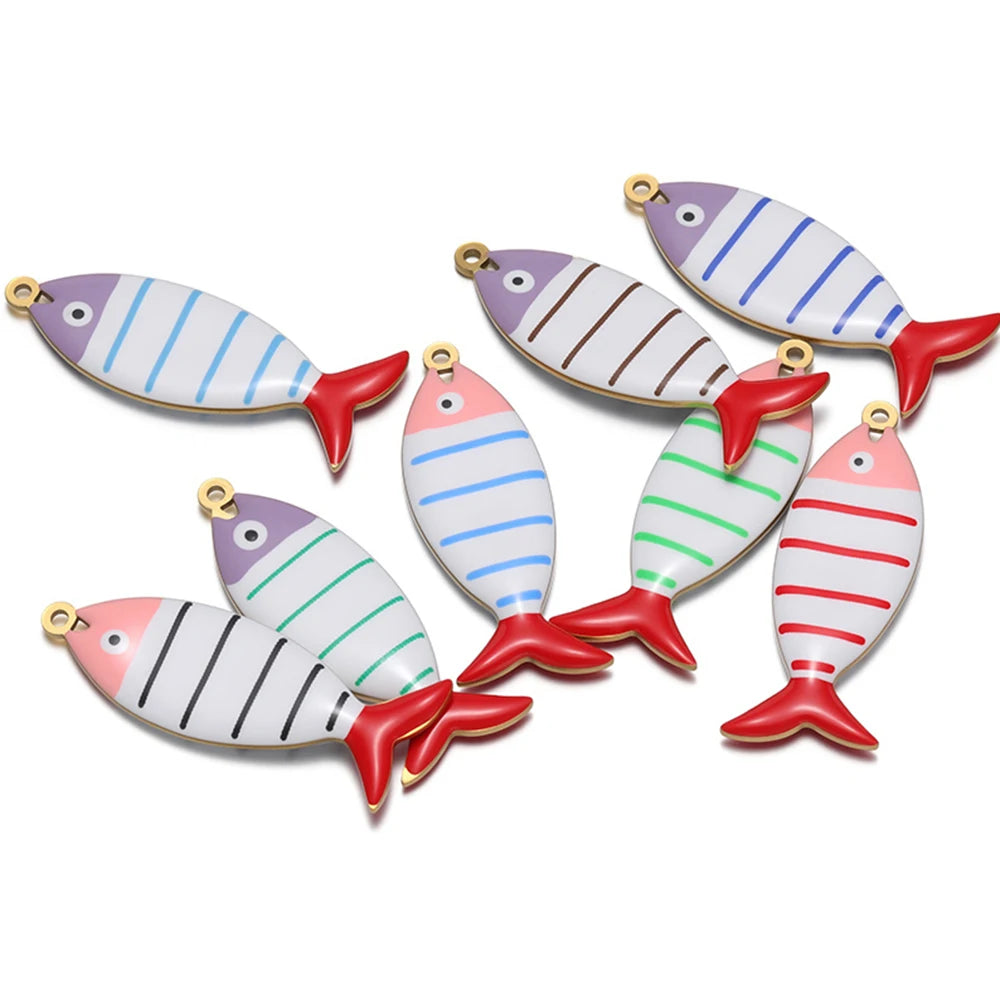 Set of enamel striped fish pendants with gold loops, red and blue accents