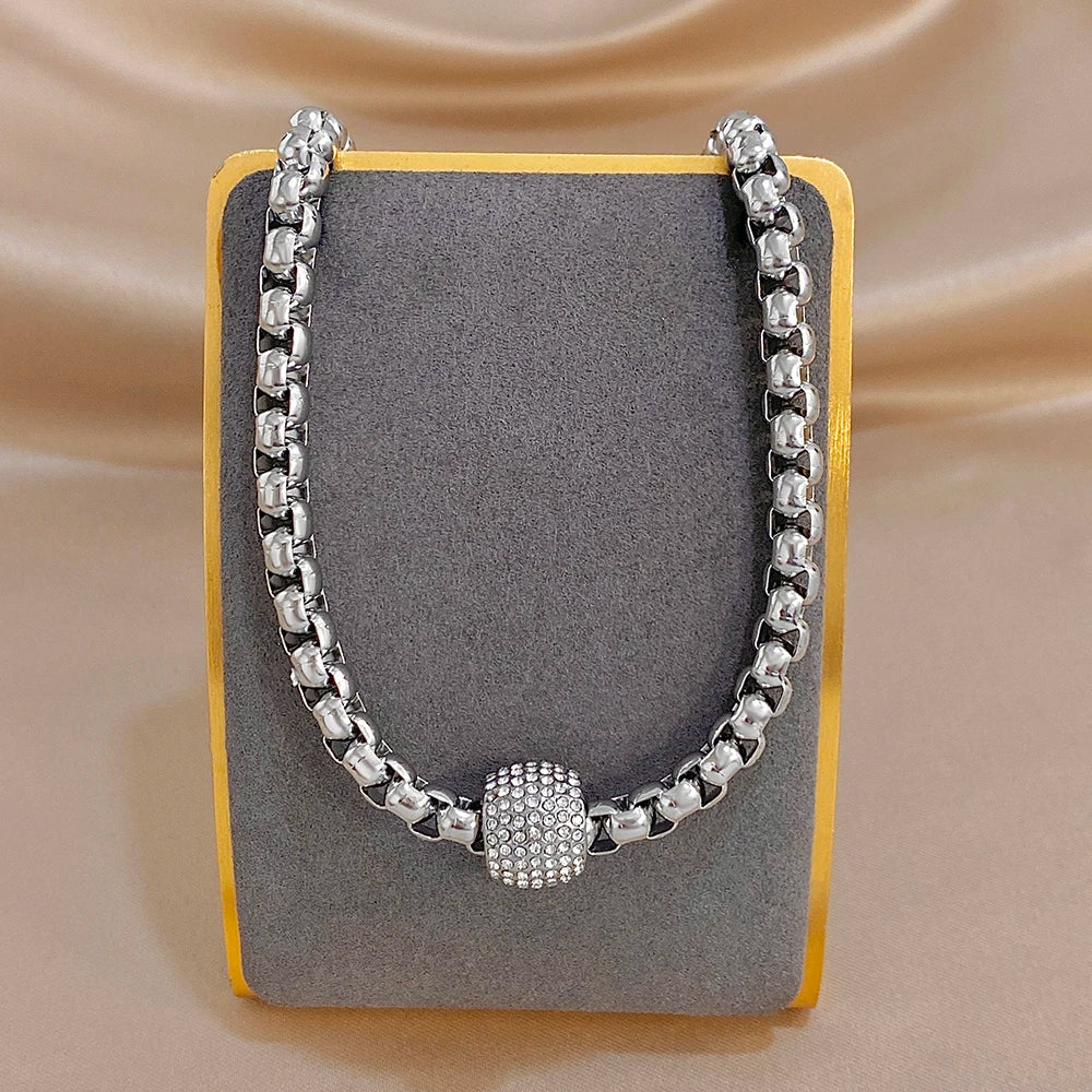 Silver-tone chunky bead chain choker necklace with round rhinestone center bead