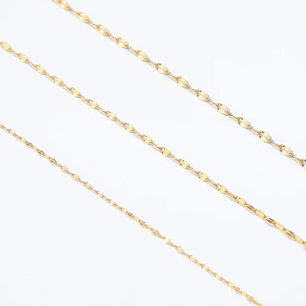 Gold flat oval cable chain links, oval filled pattern