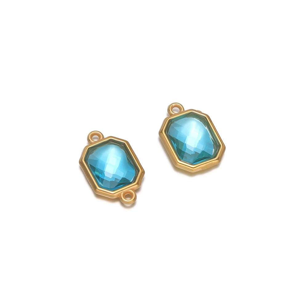 Blue faceted glass octagon charm connector with gold-tone loop, stainless steel