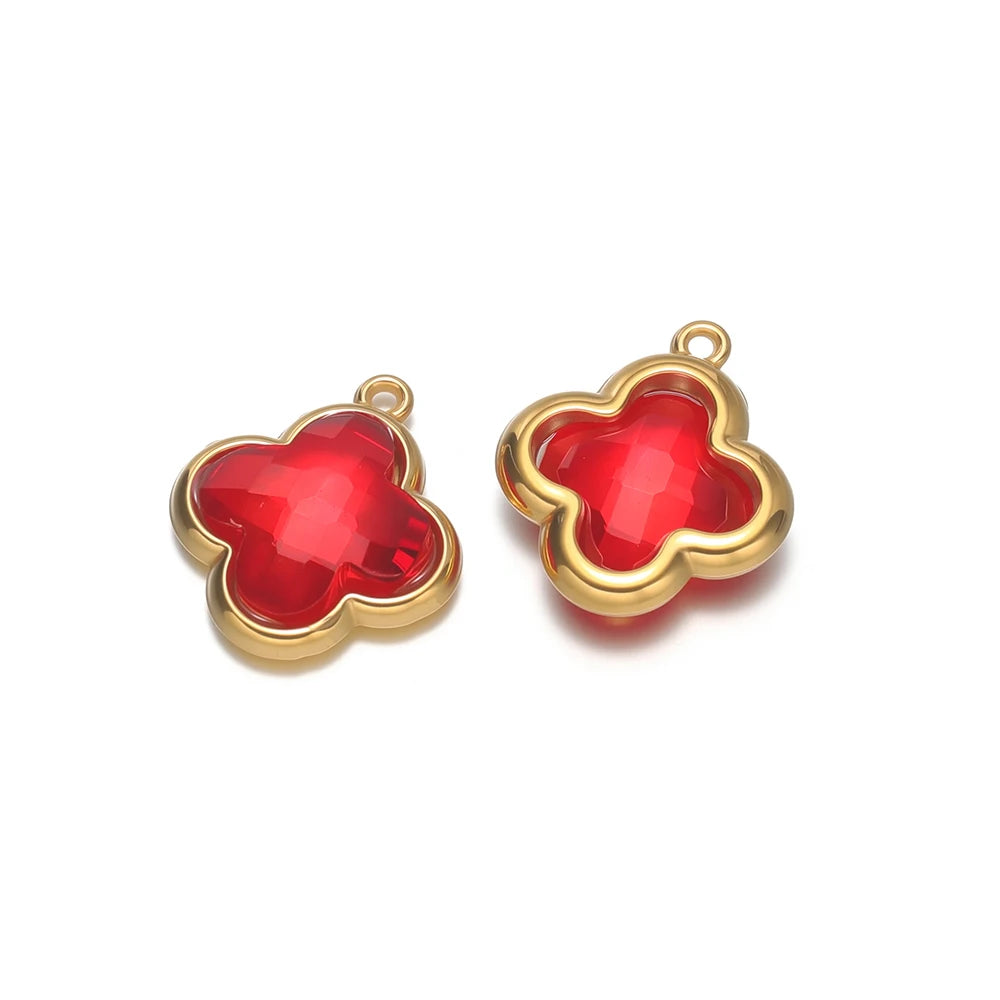 Clover glass pendant charm, red stone with gold-tone frame and connector loops