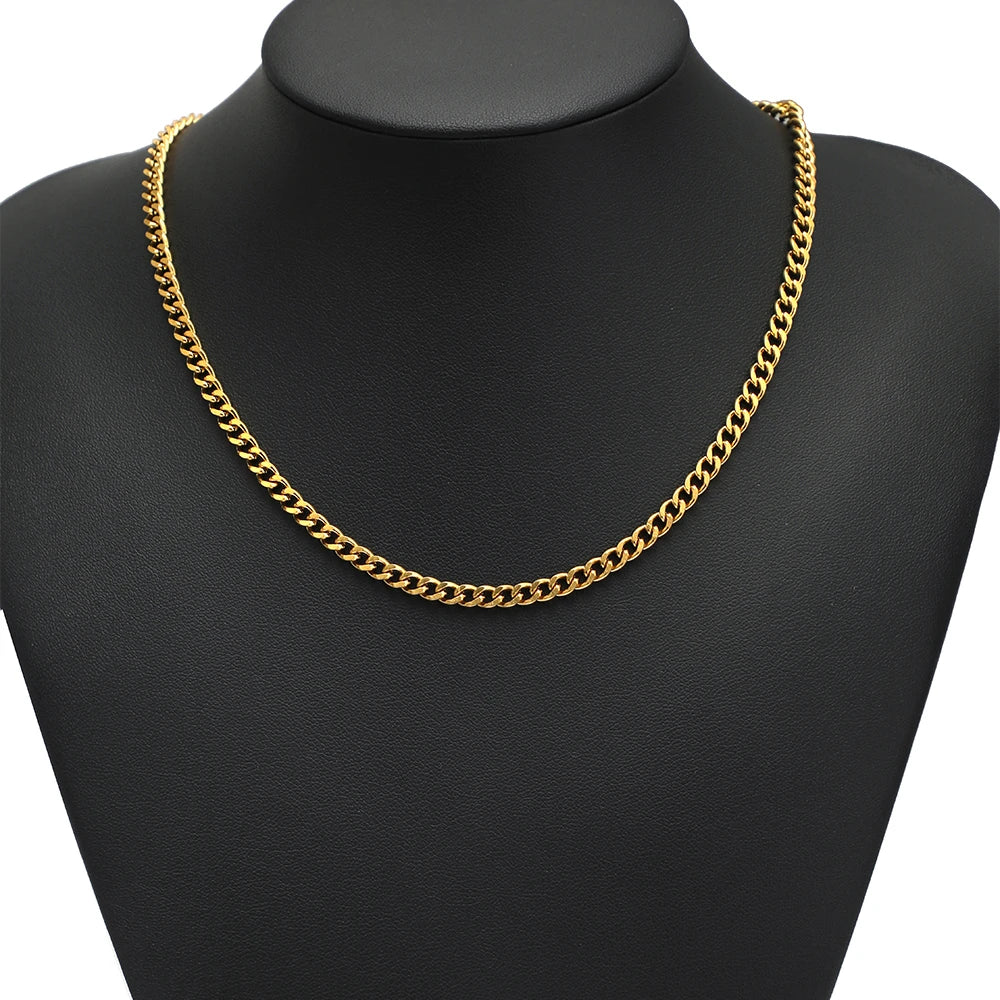 Gold-plated stainless steel Cuban link chain necklace on a black mannequin