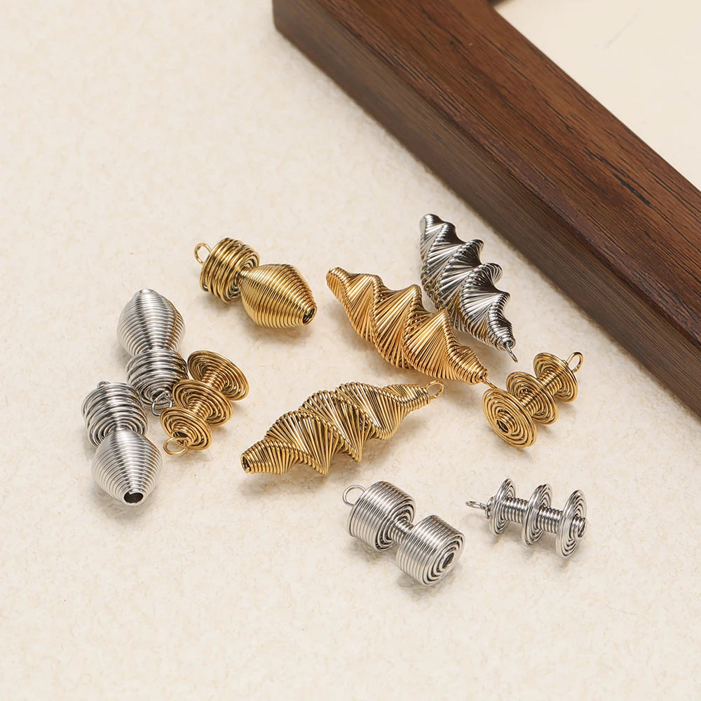 Spring-effect charm pendants in gold and silver tones with hanging loop for DIY jewelry