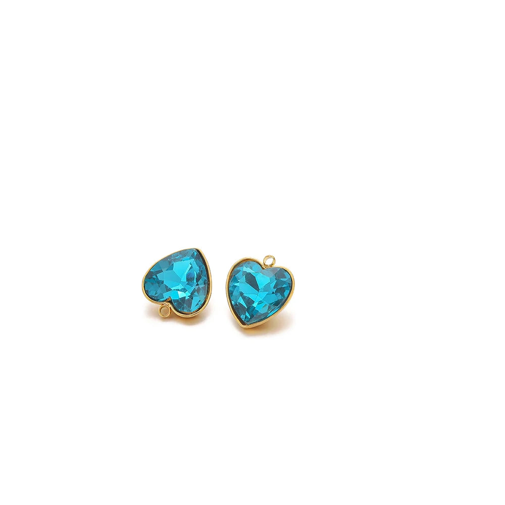 Heart-shaped crystal pendant charm, blue stone with gold-tone loop bail