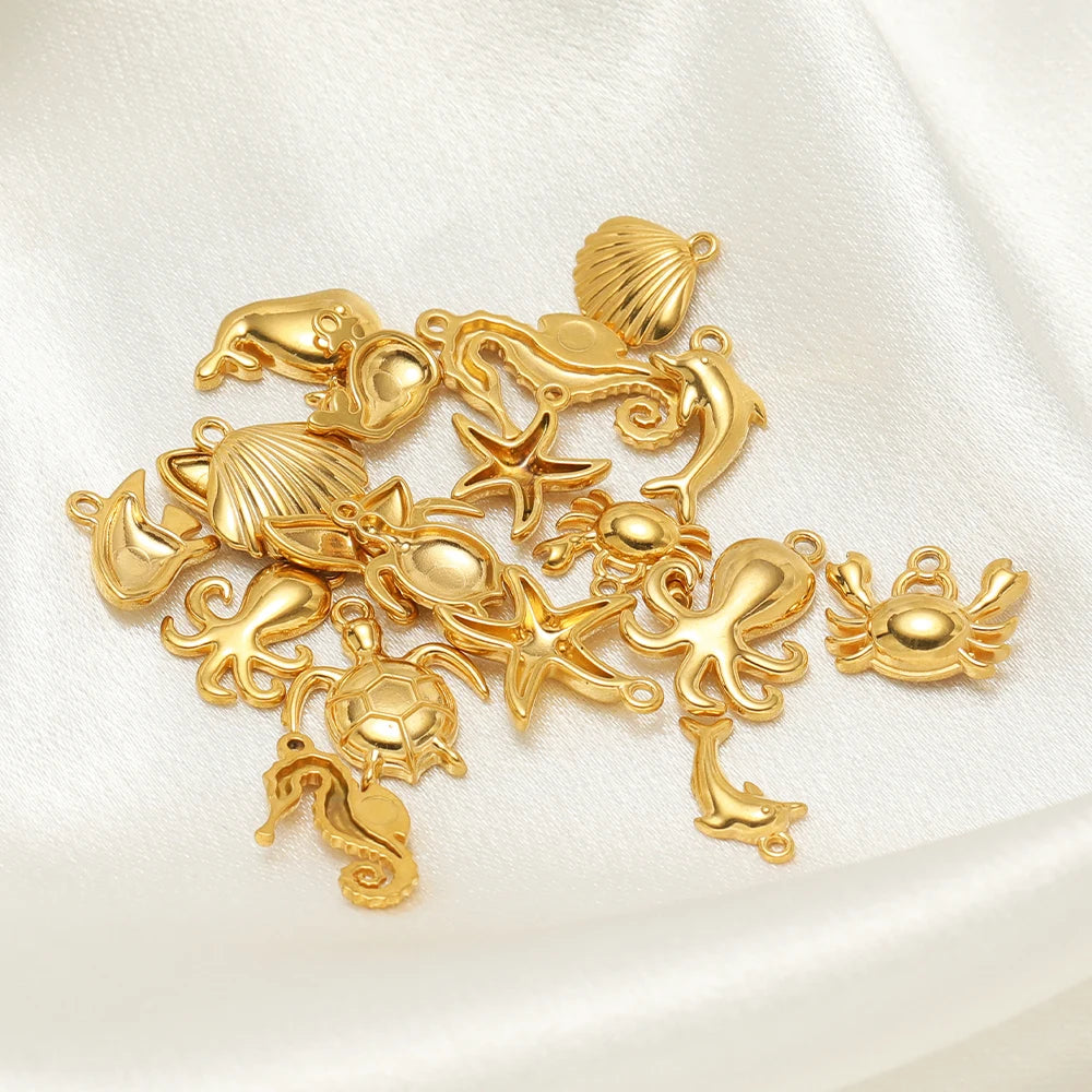 Gold-tone mixed sea animal charms with loop tops
