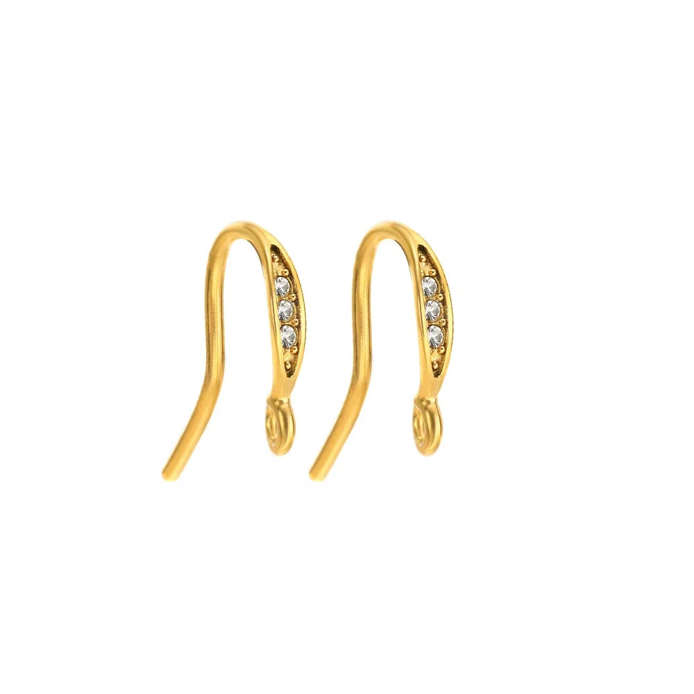 Gold-tone ear wire hooks with vertical oval clear crystal stone panels