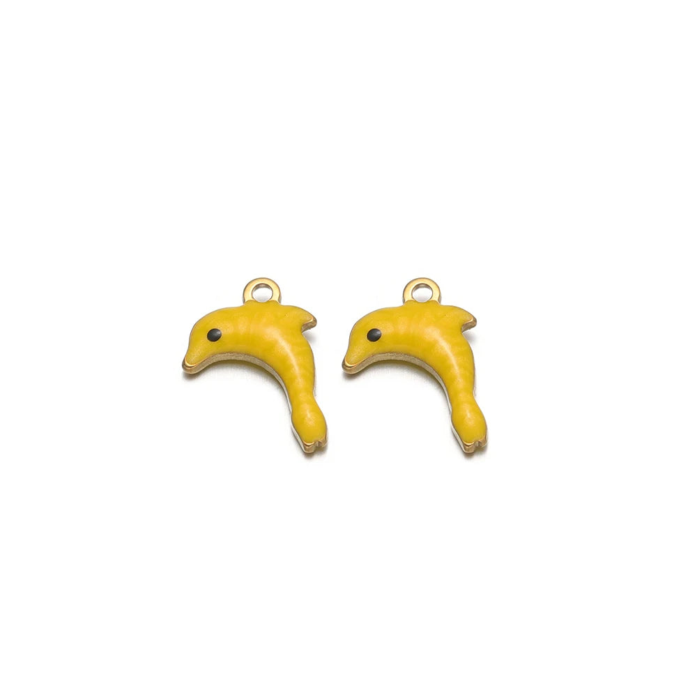 Two yellow enamel dolphin charms with gold-tone loops