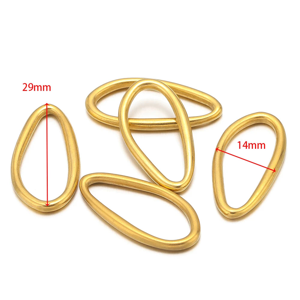 Gold irregular oval link charms, 5-pack; marked 29mm and 14mm