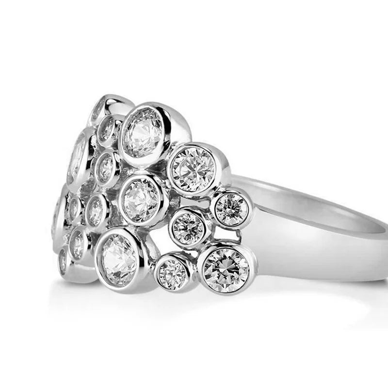 Silver-toned ring with rows of round cubic zirconia stones on a slim band