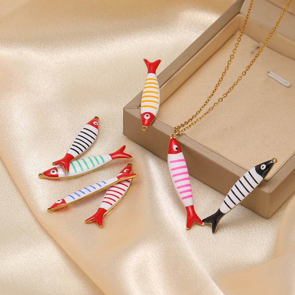 Striped fish enamel pendant charms with red fins and multicolor stripes, gold loop and chain