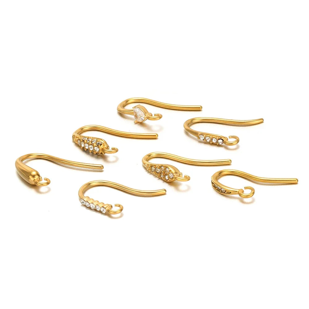 Set of gold-tone ear wire hooks with clear crystal-stone accents for jewelry making