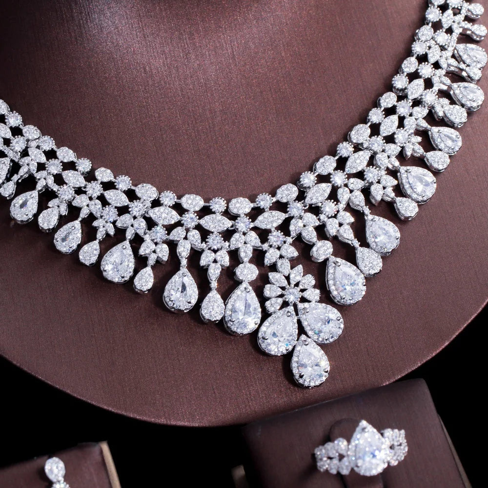 Close-up of rhinestone teardrop necklace with floral drop details