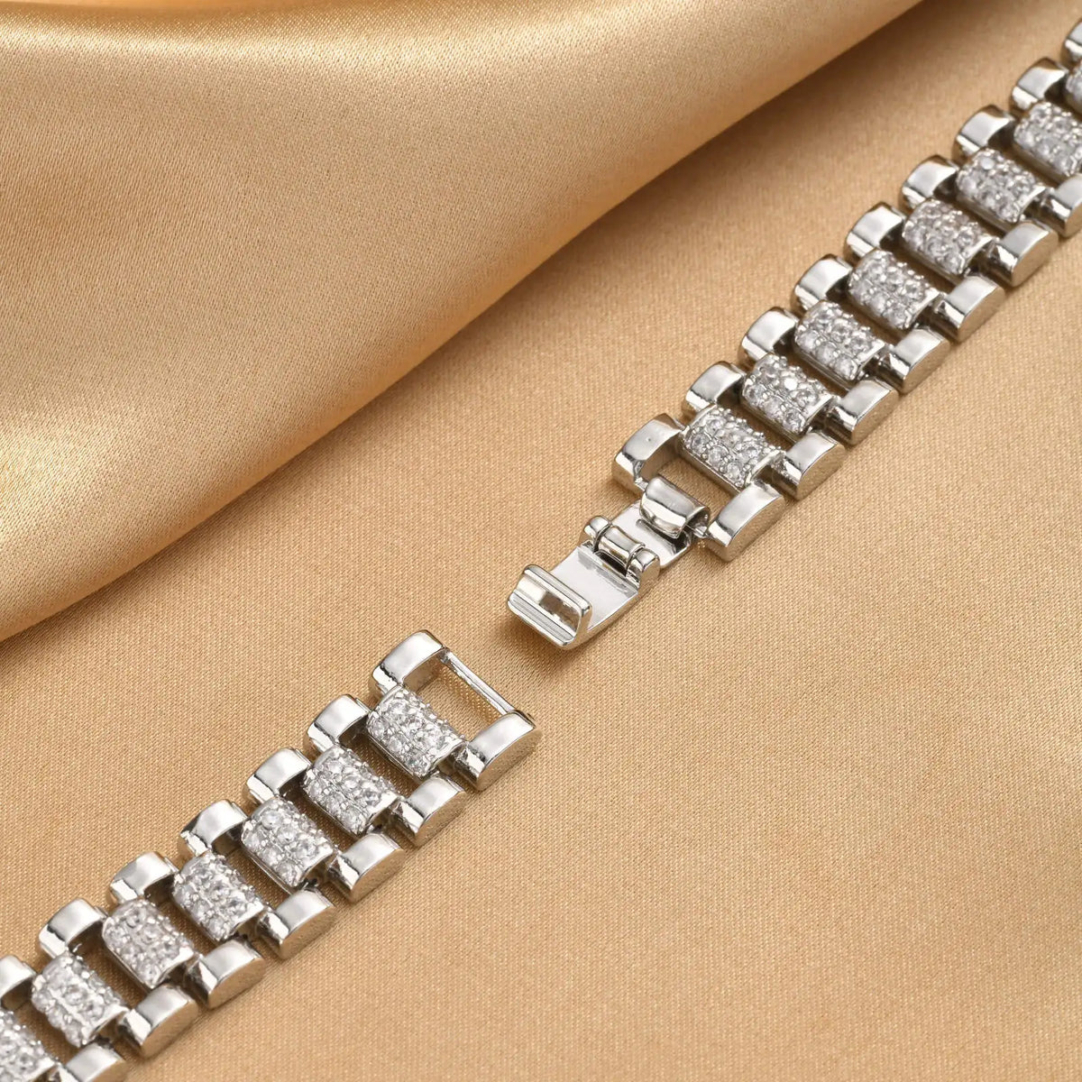 Close-up of silver-tone cubic zirconia link bracelet with rectangular stone settings